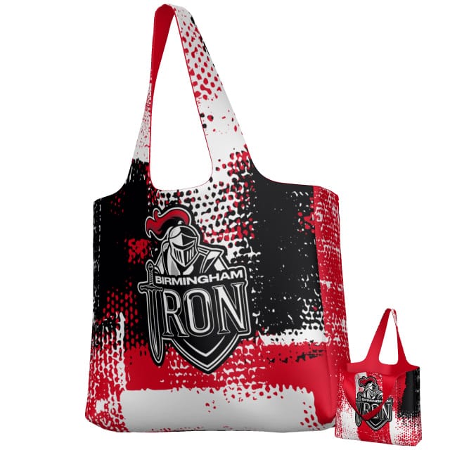 The Teamatical Birmingham Iron Women's Football DNA Packable Zip Tote features a red, black, and white abstract design with a "Birmingham Iron" logo. Durable and lightweight, it's ideal for daily use or travel.