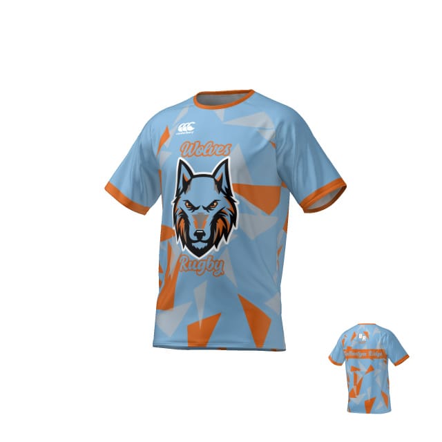The Ballantyne Ridge CANTERBURY ECO-SUBLIMATE SS RAGLAN TEE by Teamatical is a light blue rugby shirt with orange and white geometric patterns, a wolf head, and "Wolves Rugby" text on both front and back.