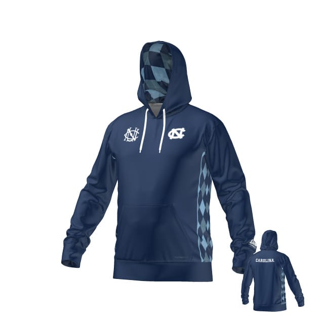The Teamatical UNC Rugby Canterbury Performance Hoody is a navy blue hoodie featuring diamond-patterned inner hood and side panels, white logos on the front, and "CAROLINA" printed on the back.