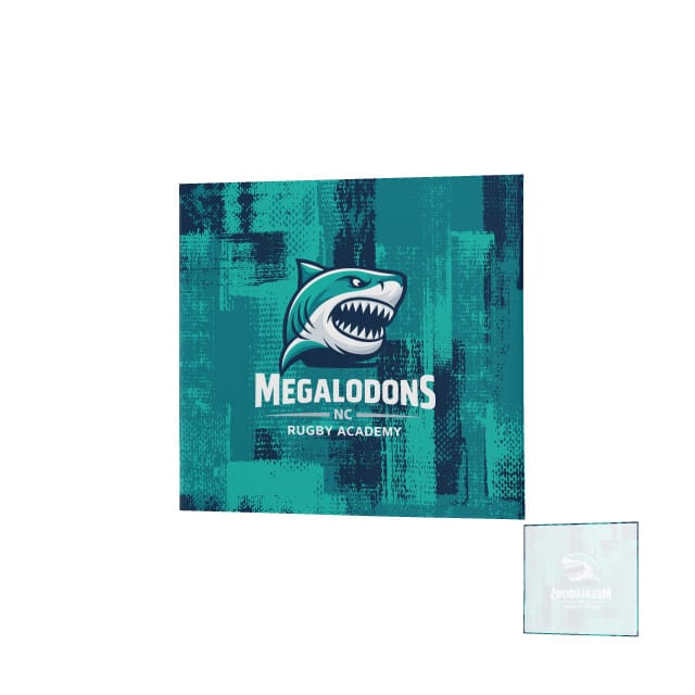 A square logo with a fierce shark above "NC Megalodons Rugby Academy" on textured teal, plus a mirrored mini-logo. Inspired by Teamatical’s DNA Denver Blanket and its warm DNA-Warm Tech Fleece and UPF 50 sun protection.