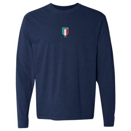 The Italy Vintage Long Sleeve Comfort Tee by EMB S&S Activewear is a navy shirt featuring a small Italia shield logo and “1999” on the chest, adding an authentic vintage Italian vibe.