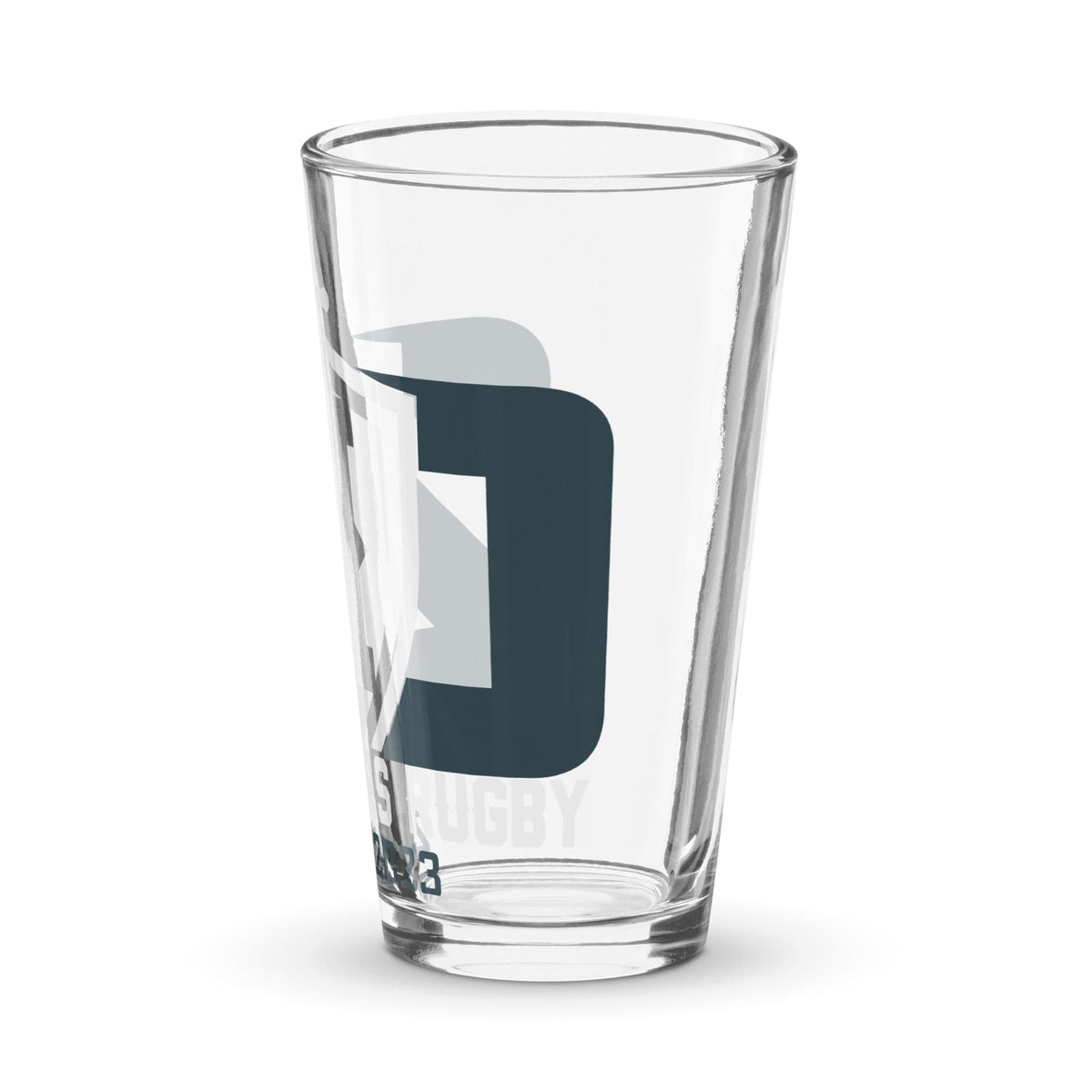 A clear PF shaker pint glass with a dark gray logo reading "1 rugby" on the side, displayed against a white background.