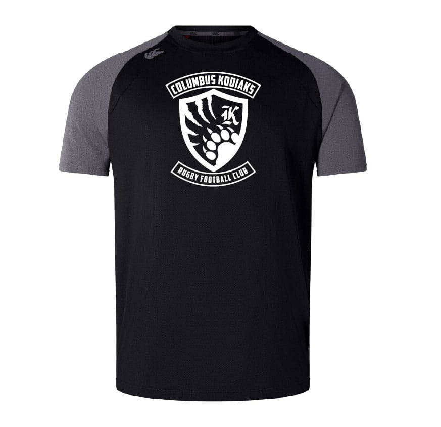 The Columbus Kodiaks Elite Training Tee by WRS Canterbury is a black and gray short-sleeve shirt with the club logo, made from lightweight, durable Vapodri fabric for comfort and performance.