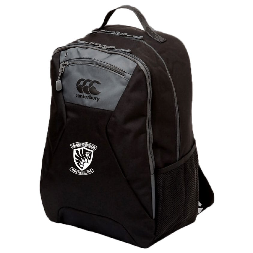 The EMB Canterbury Columbus Kodiaks Medium Backpack is black with gray accents, ergonomic shoulder straps, a front zipper pocket, mesh side pocket, and a white sports team logo on the lower front.