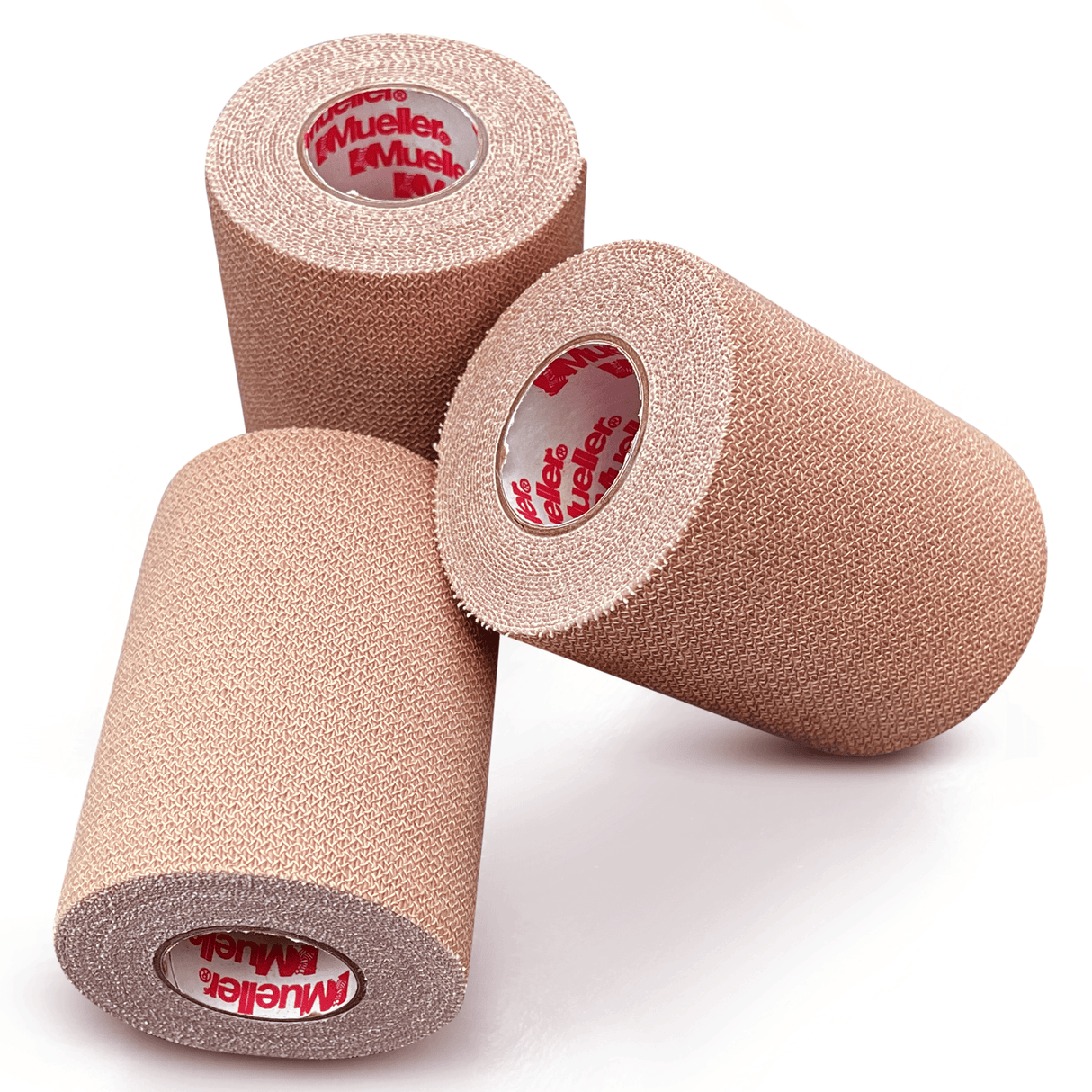 Three beige rolls of adhesive bandage tape.