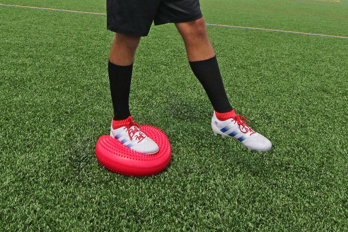 Red Wobble Pillow Being Used by Athlete