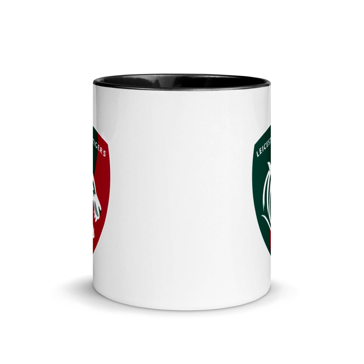 White ceramic mug black interior and a green, red and white Leicester Tigers logo on each side.