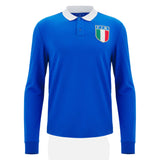 The Italy 25/26 Vintage Long Sleeve Supporters Jersey by Macron features a blue rugby-inspired design, white collar, and an F.I.R. badge with the Italian flag on the left chest.