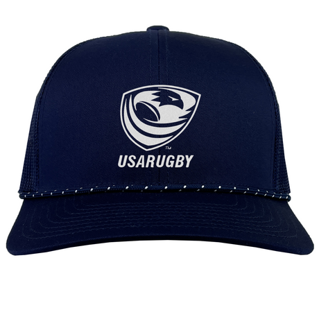The EMB Augusta USA Rugby Navy/White Crest Braid Cap features the USA Rugby logo and "USARUGBY" text on the front, with stylish white trim on the brim.