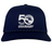 Celebrate USA Rugby's 50th with the EMB Augusta navy blue trucker snapback braid cap, featuring a white "50" logo with stars and a stylized eagle.