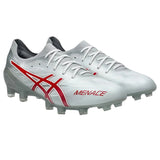 A pair of ASICS Menace 5 FG soccer cleats in White/Speed Red, featuring red accents, laces, molded studs designed for firm ground, and ASICS branding on the sides, displayed against a white background.