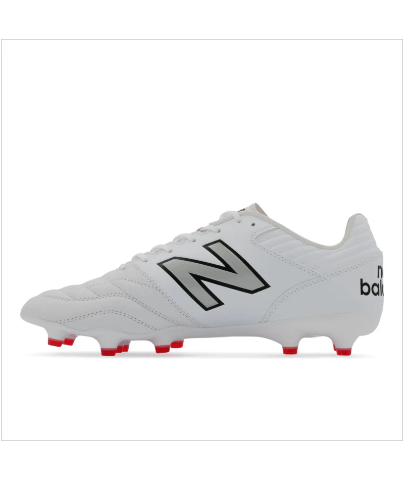 The New Balance 442 v2 Pro Synthetic FG - White/Silver is a white rugby cleat featuring black New Balance branding and red studs on the sole, making it ideal for firm ground pitches.