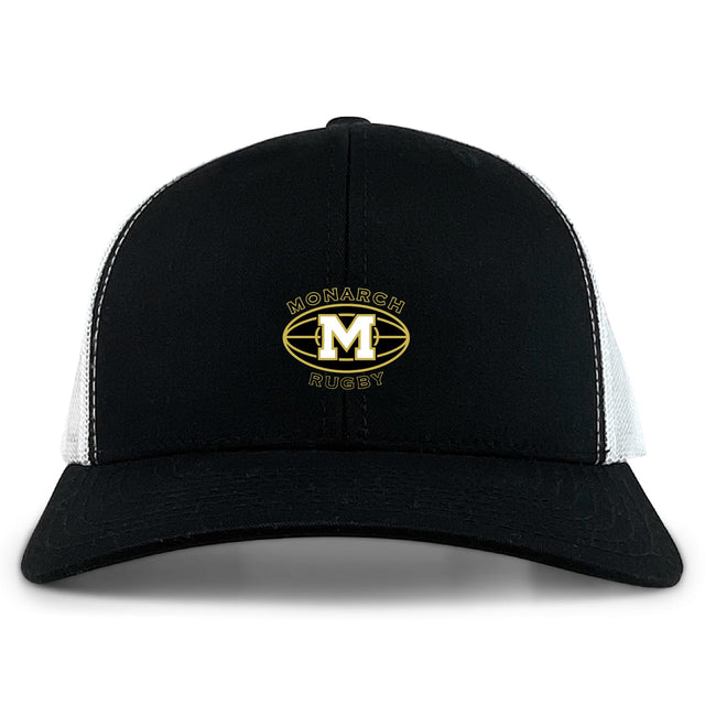 The Monarch Rugby Club Retro Trucker Cap by EMB S&S Activewear features a black and white design, an embroidered gold "M" rugby ball logo on the front, and an adjustable snapback closure.