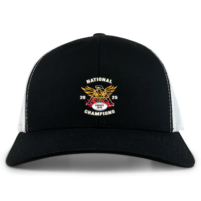 The EMB S&S Activewear Atlanta Old White Rugby Champs Retro Trucker Cap features a black and white design with an embroidered 2025 National Champions eagle, football, and banner emblem on the front, plus an adjustable snapback closure.