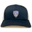 The EMB S&S Activewear Franklin County High School Rugby Retro Trucker Cap features a navy and beige design, an embroidered rugby shield with lion on the front, and a snapback closure for adjustable fit.