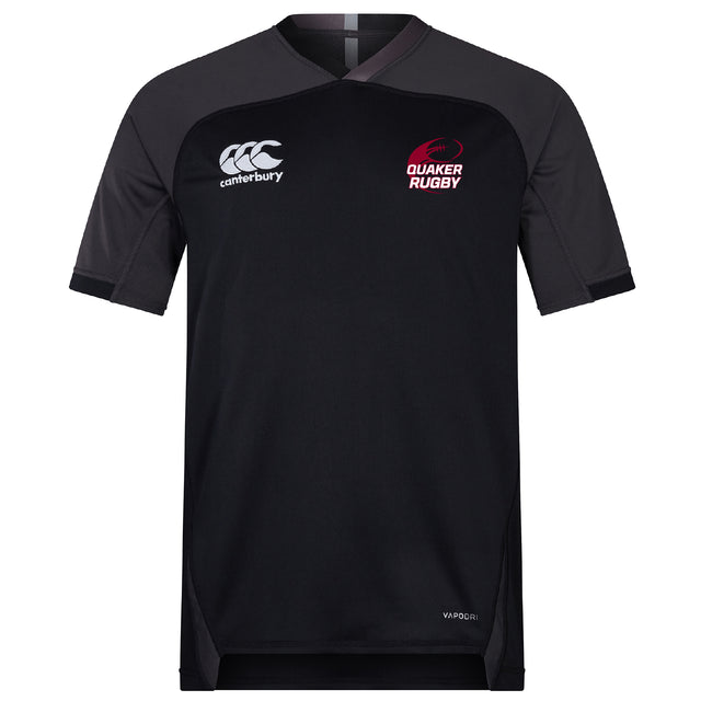 The Guilford College Vapodri Evader Jersey by EMB Canterbury is a black short-sleeve rugby jersey featuring "Canterbury" and "Quaker Rugby" chest logos, a V-neck, subtle paneling, and VapoDri finish for added comfort.