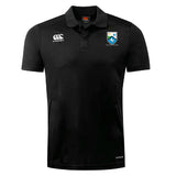 The Las Colinas Rugby Club Dry Polo by EMB Canterbury is a black short-sleeve polo with collar, featuring the Canterbury logo and a blue/white shield crest on the chest. Vapodri Technology ensures maximum breathability.