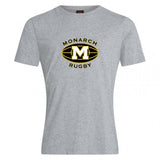 The Monarch Rugby Club Plain Tee by WRS Canterbury is a gray cotton-blend shirt featuring a black and gold “Monarch Rugby” logo with a large “M” in an oval rugby-ball design at the chest—a stylish customizable option for fans.