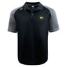 The Monarch Rugby Club Elite Polo by EMB Canterbury is a short-sleeve black and gray shirt with a "M" logo and “MUDDOGS” on the left chest, made from lightweight Vapodri fabric, plus the Canterbury logo on the right shoulder.