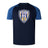 The Franklin County High School Rugby Elite Training Tee by WRS Canterbury features a navy body, blue sleeves, and a bold shield logo with eagle head. Made from Vapodri fabric, it's lightweight and durable for active performance.