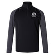 The Fortivus Academy Women's Elite First Layer by Canterbury, from EMB Canterbury, is a black and dark gray quarter-zip pullover with "Fortivus Academy" and crest on the left chest for peak performance comfort.