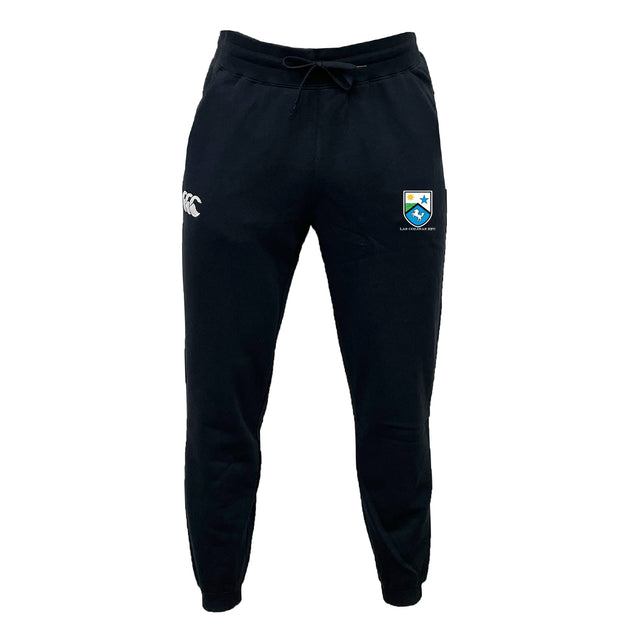 The Las Colinas Rugby Leisure Sweatpant by EMB Canterbury features soft organic cotton, a white Canterbury logo on the left thigh, and a blue-yellow shield emblem on the right for stylish comfort.