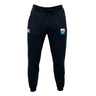 The Las Colinas Rugby Leisure Sweatpant by EMB Canterbury features soft organic cotton, a white Canterbury logo on the left thigh, and a blue-yellow shield emblem on the right for stylish comfort.
