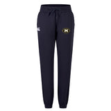 The Monarch Rugby Club Women's Leisure Sweatpant by EMB Canterbury features a navy blue design, drawstring waist, white Canterbury logo on the left thigh, and a circular yellow and black crest on the right thigh.