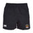 The Atlanta Old White Rugby Champs Player's Drill Short by EMB Canterbury features an elastic waistband, the Canterbury logo on the left leg, and a National Champions emblem on the right for a classic athletic style.