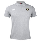 The Monarch Rugby Club Waimak Polo by EMB Canterbury is a light grey short-sleeve shirt featuring a "Monarch Rugby" logo on the left chest and a white Canterbury logo on the right.