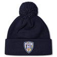 Stay warm in the EMB Canterbury Franklin County High School Rugby Pom Pom Beanie by Canterbury, featuring a navy blue knit, cozy fleece lining, and a "Flyer RFC" shield logo patch on the front cuff.