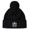 The Fortivus Academy Pom Pom Beanie by EMB Canterbury is a black knit beanie with a pom-pom and features the Fortivus Academy logo and text embroidered in white on the folded brim.