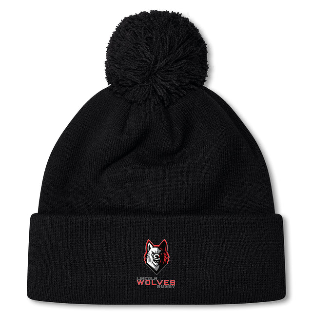 Stay cozy and stylish with the Lincoln Wolves Pom Pom Beanie by Canterbury. This black EMB Canterbury knit features a pom-pom, embroidered wolf head logo, and "Wolves" text on the front cuff—perfect for chilly days.
