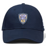 The Franklin County High School Rugby Flexfit Drill Cap by EMB Canterbury features a navy blue design with a "Flyer RFC" shield embroidered logo patch on the front center.