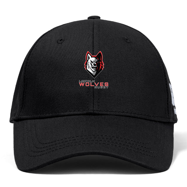 The Lincoln Wolves Flexfit Drill Cap by EMB Canterbury features a stylized wolf head and "Wolves Rugby" embroidered on the front, delivering sporty style and comfort.