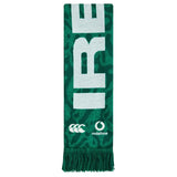 Show your support with the Ireland 25/26 Scarf by Canterbury. Featuring bold green and white colors, large partial “IRE” text, two logos at the bottom, and green fringe tassels on each end, this official Canterbury scarf is the perfect accessory for any fan.