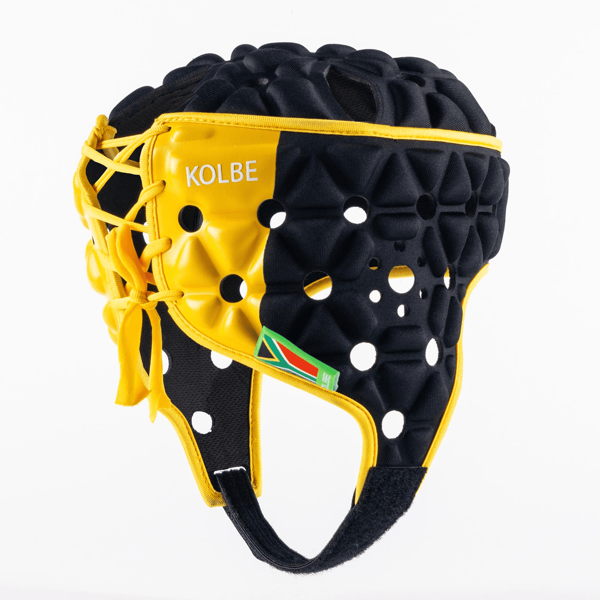 A black and yellow Gilbert Limited Edition Cheslin Kolbe Air Headguard features "Kolbe" printed on the side. This lightweight headguard, designed for optimal shock absorption, also includes a small flag attached to one of the yellow sections.