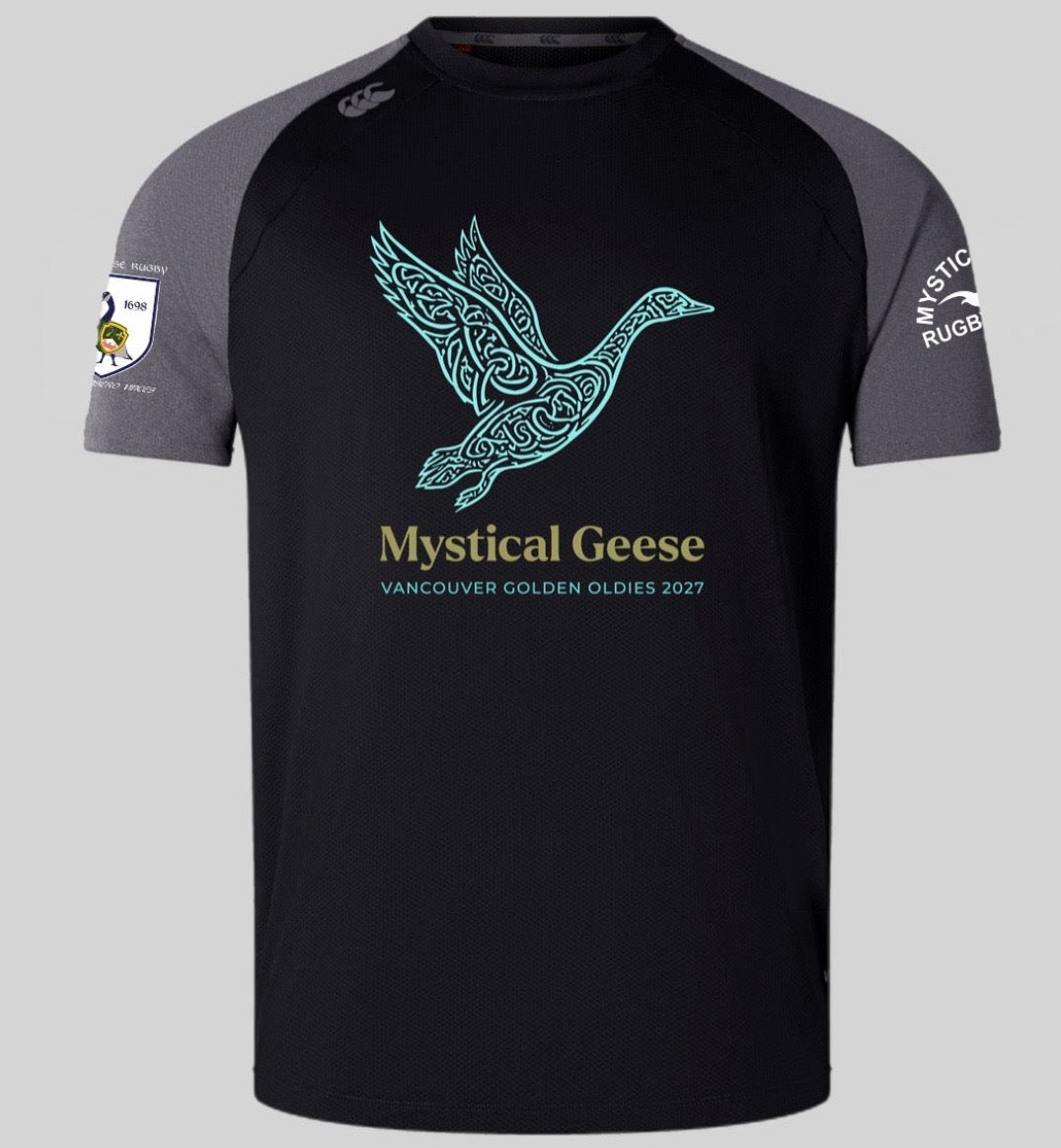 The Mystical Geese Elite Training Tee by Canterbury from WRS Canterbury features a black and gray rugby jersey design with a stylized goose graphic, “Mystical Geese,” and “Vancouver Golden Oldies 2027” on the front, plus sleeve patches. Made from Vapodri fabrics for superior comfort, this lightweight and durable tee is ideal for both fans and players of the Mystical Geese Elite Training Tee collection.