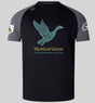 The Mystical Geese Elite Training Tee by Canterbury from WRS Canterbury features a black and gray rugby jersey design with a stylized goose graphic, “Mystical Geese,” and “Vancouver Golden Oldies 2027” on the front, plus sleeve patches. Made from Vapodri fabrics for superior comfort, this lightweight and durable tee is ideal for both fans and players of the Mystical Geese Elite Training Tee collection.