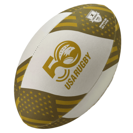 The Gilbert Limited Edition USA Rugby 50th Anniversary Supporters Ball combines white and gold colors, an embossed official insignia, the anniversary logo, and American flag patterns—an ideal collectible for any rugby fan.