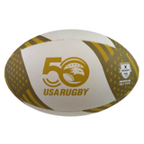 The Gilbert Limited Edition USA Rugby 50th Anniversary Supporters Ball is a white and gold size 5 rugby ball featuring star patterns, the "50 USA Rugby" design, and the Gilbert logo.