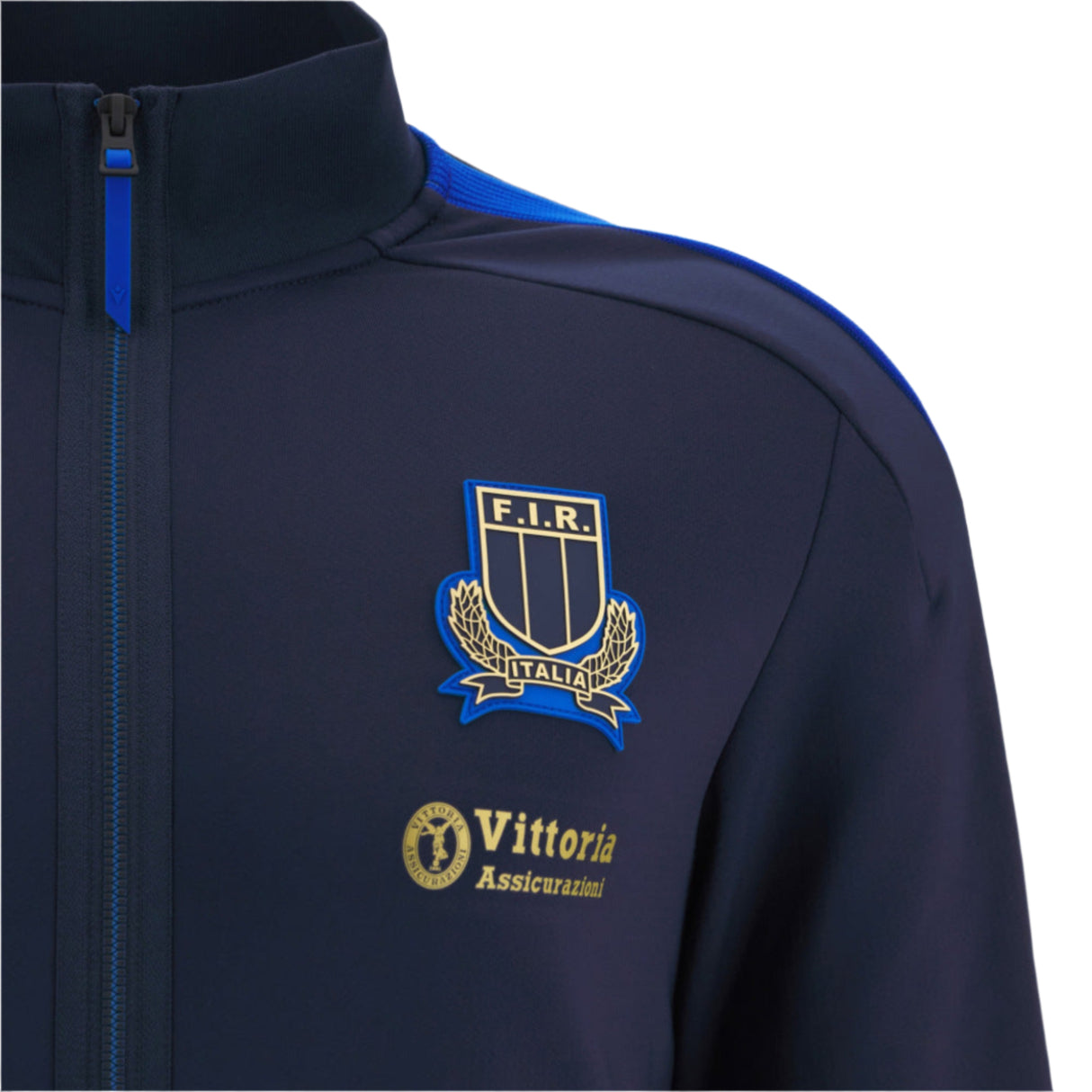 Close-up of the Italy 25/26 Anthem Jacket by Macron in navy, featuring the F.I.R. Italia crest and "Vittoria Assicurazioni" logo on the chest.