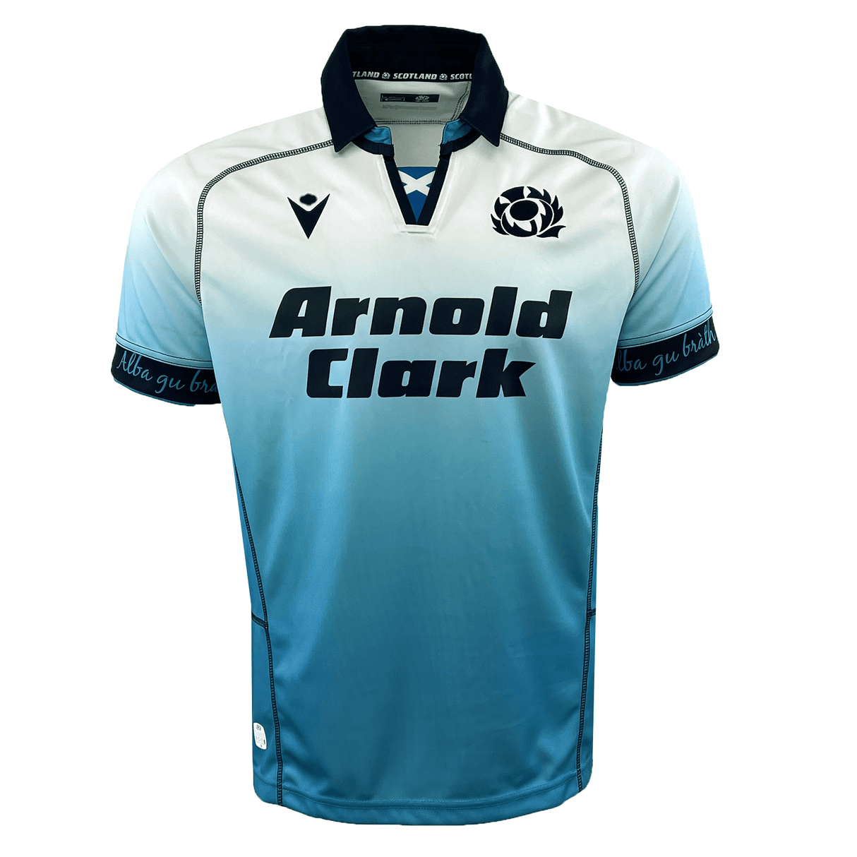 The Scotland 24/25 Replica Away Jersey by Macron boasts a light blue gradient design, complemented by a dark blue collar. It prominently features the Scottish Rugby Crest and the "Arnold Clark" sponsor logo, reflecting impeccable style and team spirit for men.