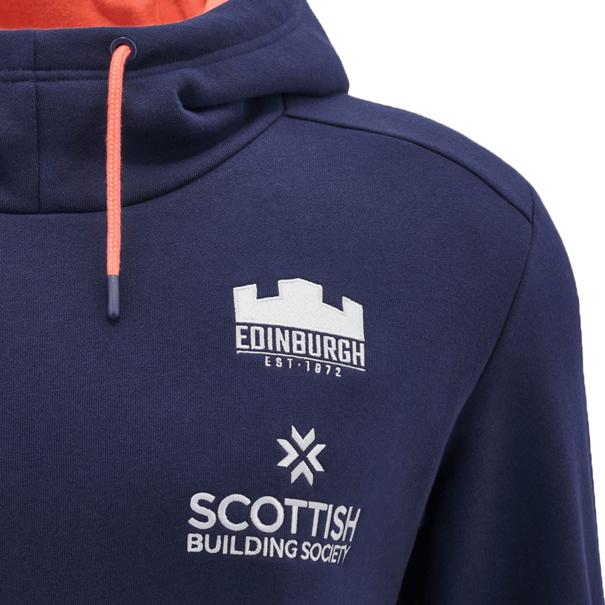 A close-up of the Edinburgh Player Travel Hoodie 24/25 by Macron in navy showcases the "Edinburgh Est. 1872" and "Scottish Building Society" logos, with bright orange drawstrings providing a vibrant pop of color.