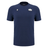 The Edinburgh 24/25 Anthem Travel Cotton T-Shirt by Macron is a navy blue athleisure tee crafted from heavyweight cotton, featuring a small white stylized logo on the upper left and a larger "Edinburgh" logo on the right.