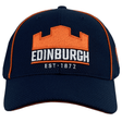 Edinburgh Baseball Cap 24/25 by Macron with orange trim, featuring an orange castle logo and "Edinburgh" in white, along with "Est. 1872." Perfect for Edinburgh Rugby fans looking to show their team spirit.