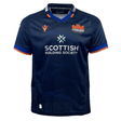 The Edinburgh 24/25 Replica Home Jersey by Macron is a home jersey in navy blue with bold orange accents, showcasing the Edinburgh logo and "Scottish Building Society" sponsor.