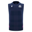 The Scotland 25/26 Player Training Singlet by Macron is a navy blue rugby top with a subtle checkered pattern, the Scottish Rugby team logo on the left chest, and a white Macron logo on the right chest.