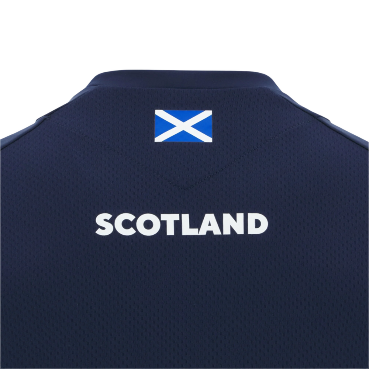 Back of the Scotland 25/26 Player Training Singlet by Macron, in navy, features "SCOTLAND" in white and a small Scottish flag above—made from breathable sportswear fabric for comfort.