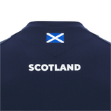 Back of the Scotland 25/26 Player Training Singlet by Macron, in navy, features "SCOTLAND" in white and a small Scottish flag above—made from breathable sportswear fabric for comfort.